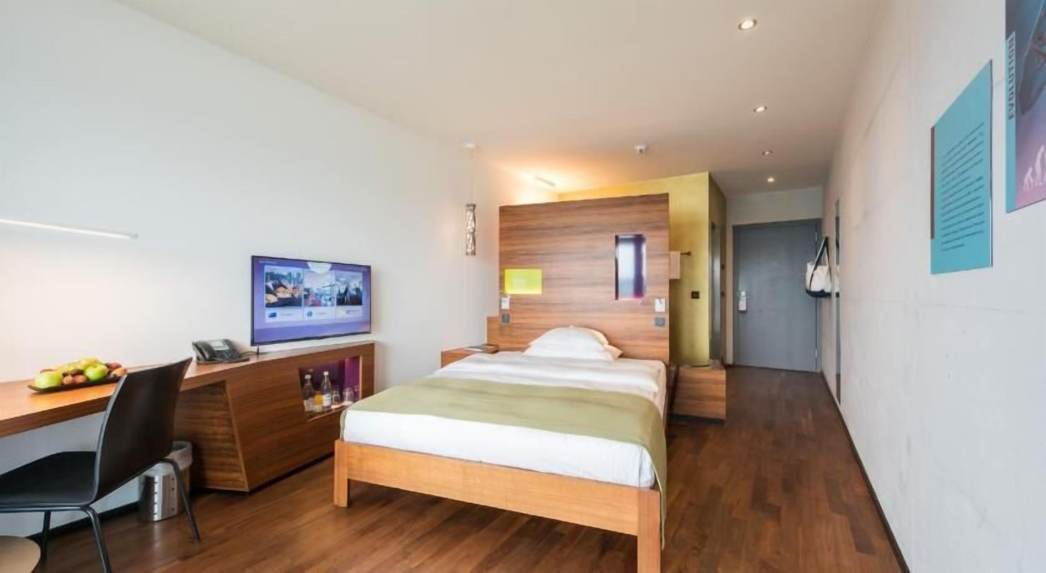 Premium bedding, free minibar items, in-room safe, desk