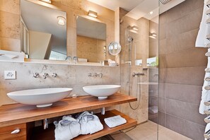 Shower, free toiletries, hair dryer, bathrobes