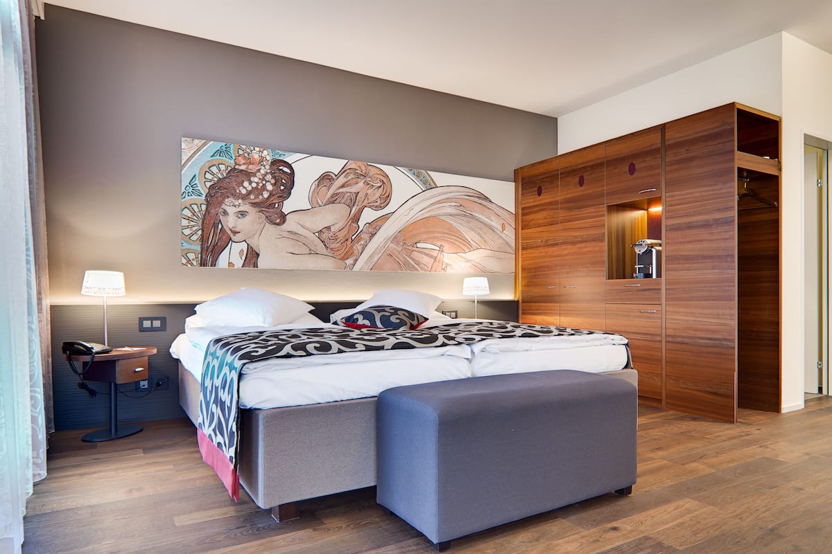 panorama junior suite with lake view  | 1 bedroom, premium bedding, free minibar, in-room safe