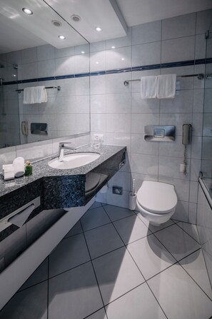 Combined shower/tub, hair dryer, slippers, towels