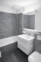 Apartment | Bathroom | Combined shower/tub, hair dryer, bathrobes, slippers