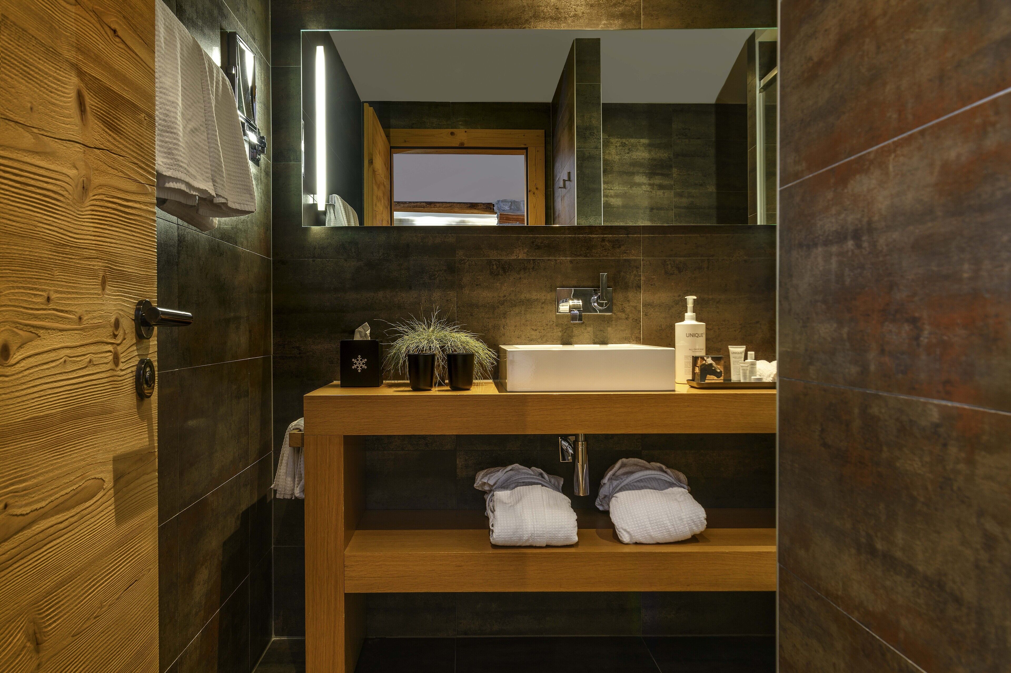 junior suite (style) | bathroom | rainfall showerhead, designer toiletries, hair dryer, bathrobes