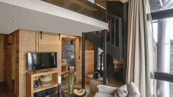 Junior Suite (Style) | Living area | 32-inch flat-screen TV with cable channels