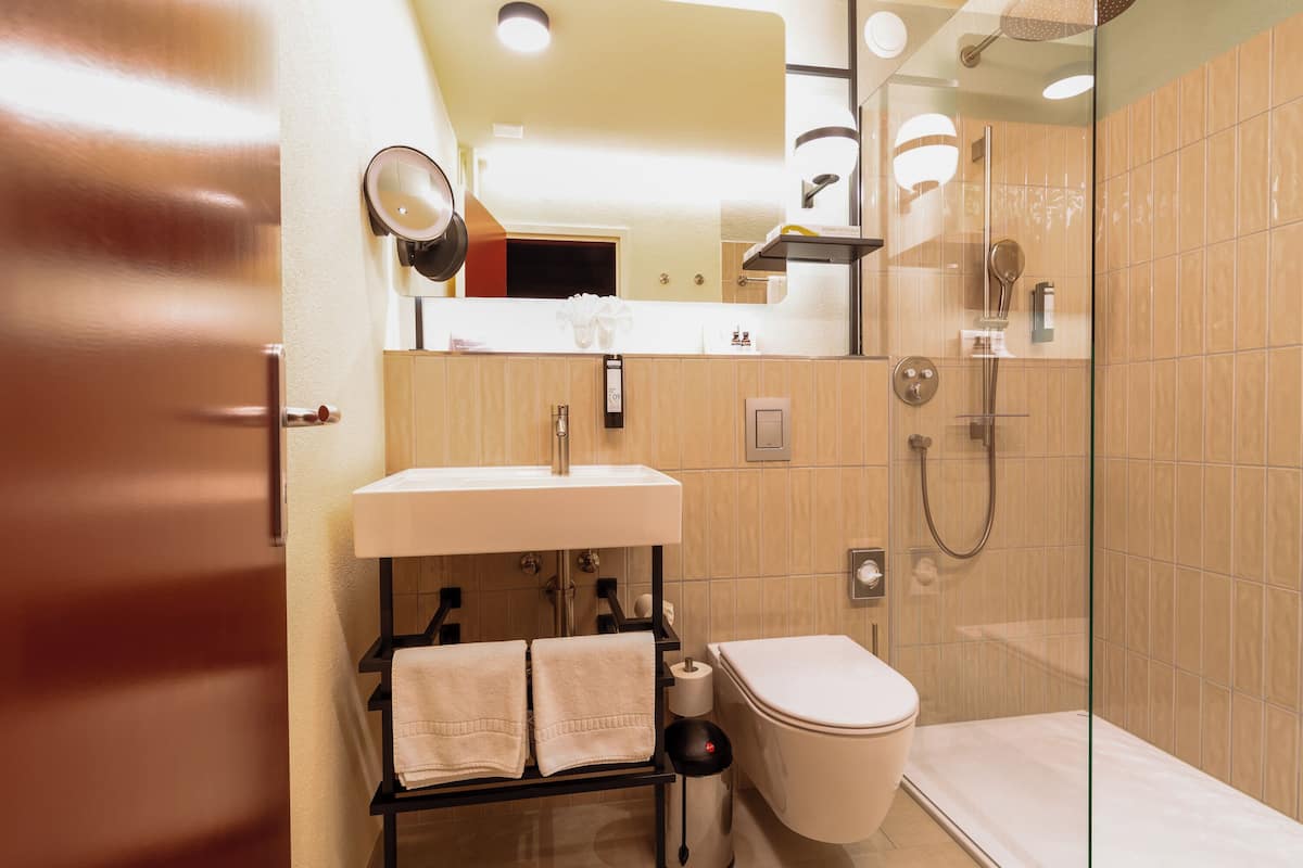 hair dryer, bathrobes, towels