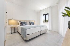 Blackout drapes, soundproofing, iron/ironing board