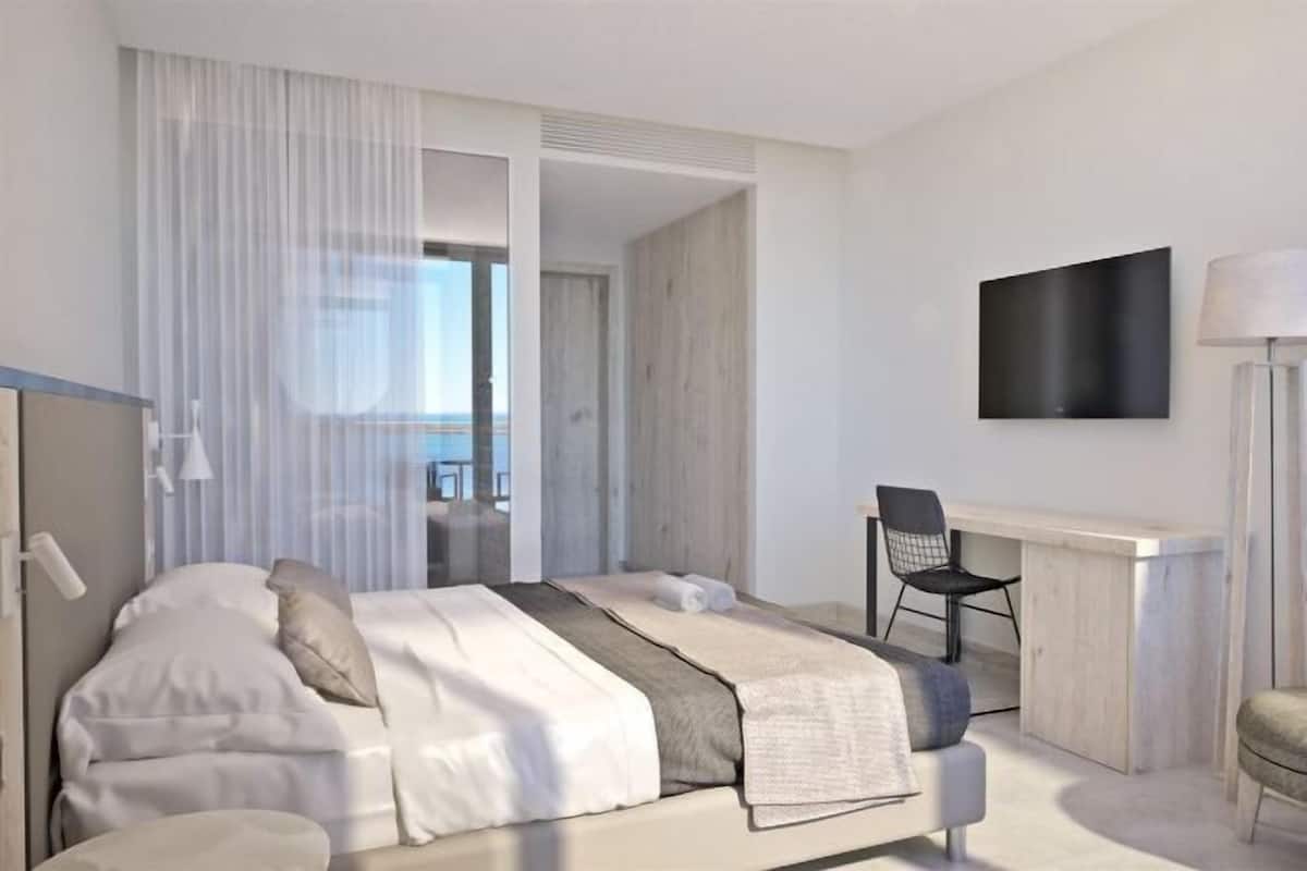 In-room safe, desk, laptop workspace, blackout curtains