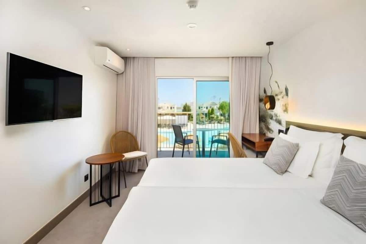 In-room safe, desk, laptop workspace, blackout curtains