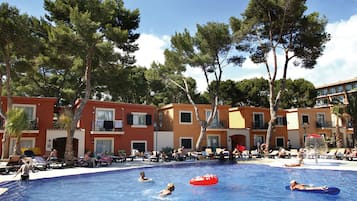 Indoor pool, outdoor pool, pool umbrellas, pool loungers