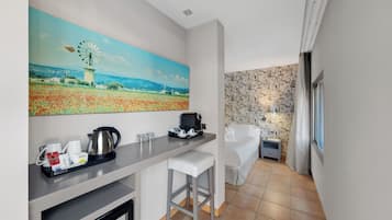 Minibar, in-room safe, iron/ironing board, free cribs/infant beds