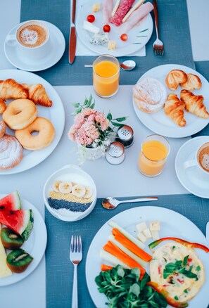 Daily buffet breakfast (EUR 8 per person)