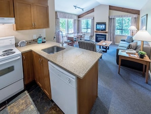 Suite, 2 Bedrooms | Private kitchen | Fridge, microwave, stovetop, coffee/tea maker