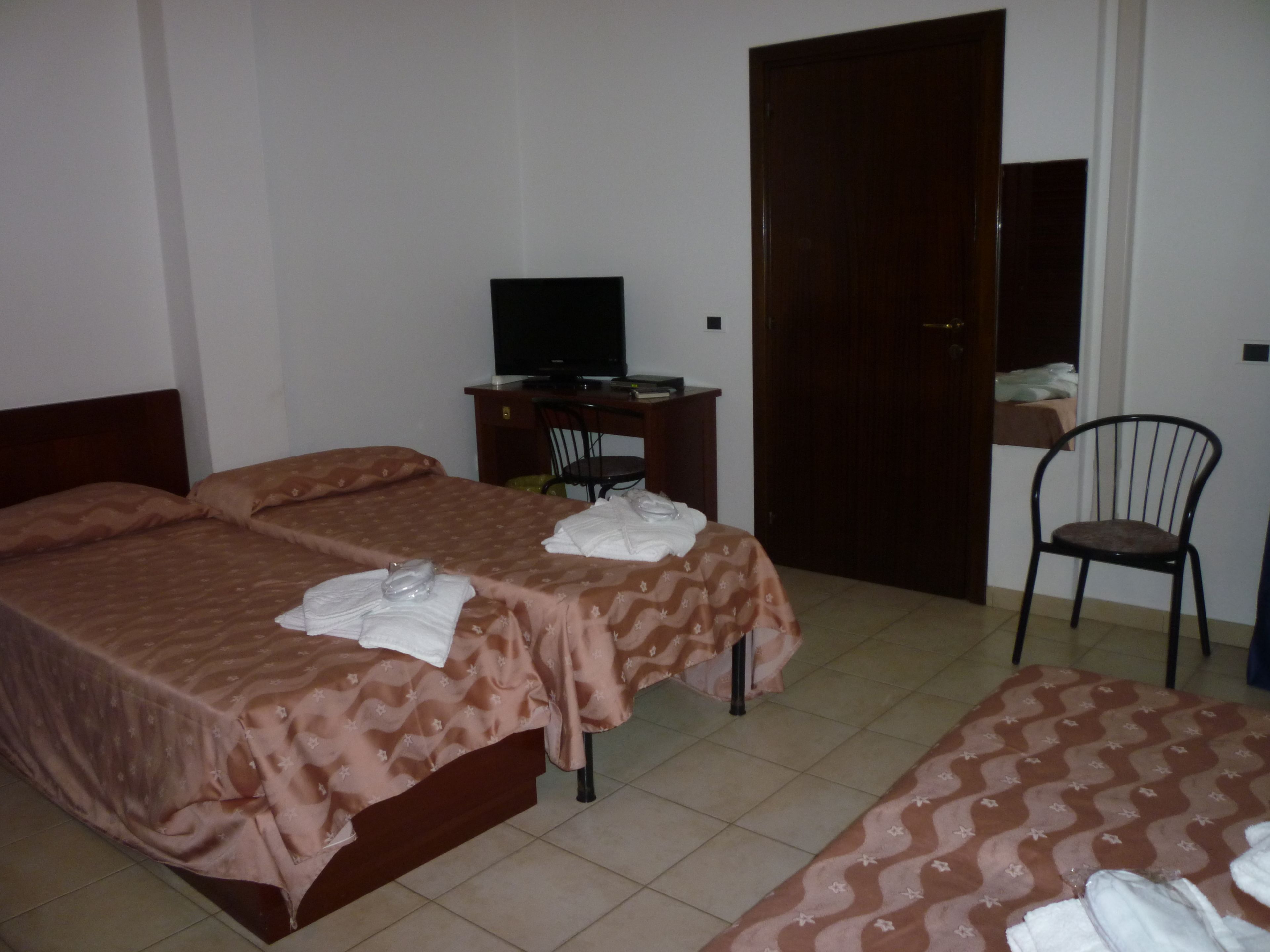 quadruple room | memory-foam beds, desk, blackout curtains, soundproofing