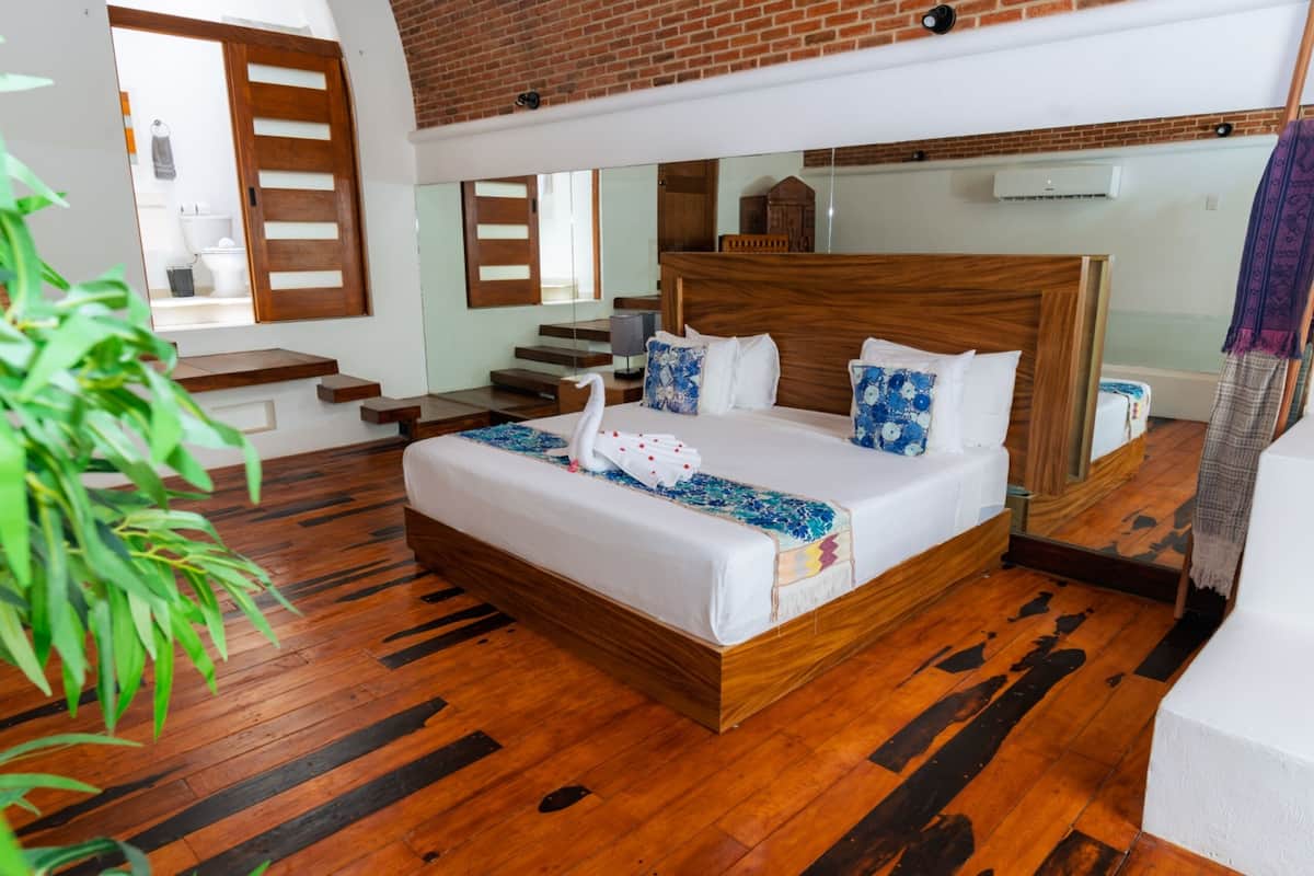 Junior Suite, Garden View | Premium bedding, in-room safe, individually decorated