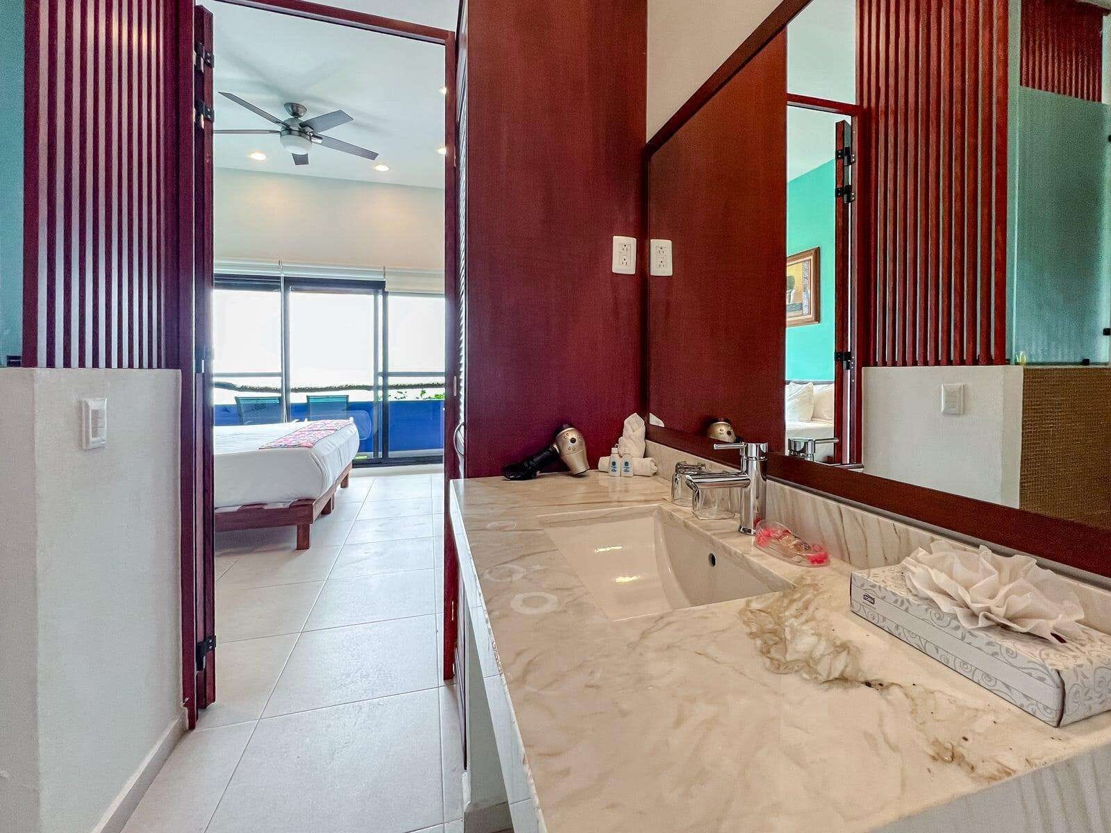 family room, ocean view | bathroom | shower, free toiletries, hair dryer, towels