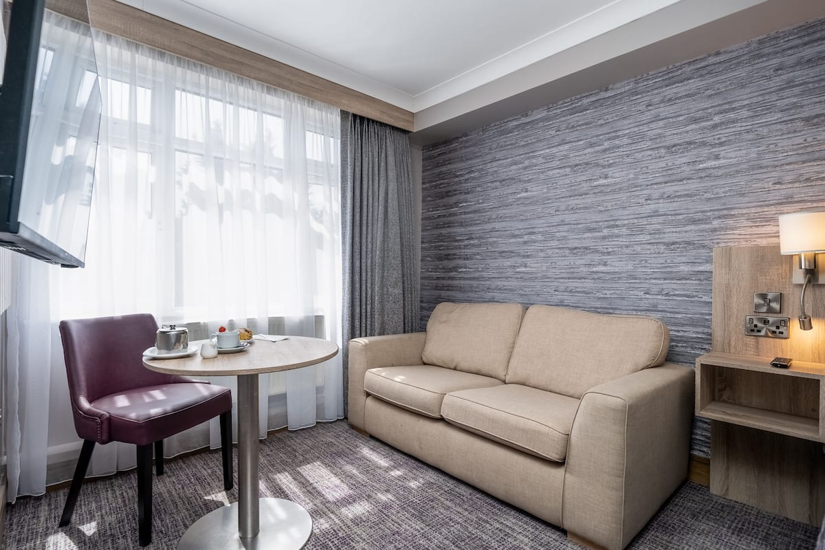 superior suite, 1 king bed | hypo-allergenic bedding, desk, iron/ironing board, free wifi