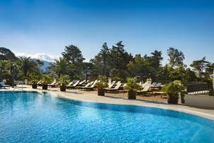 Indoor pool, outdoor pool, pool umbrellas, sun loungers