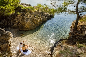 Perto da praia, serviço de traslado de/para a praia grátis
