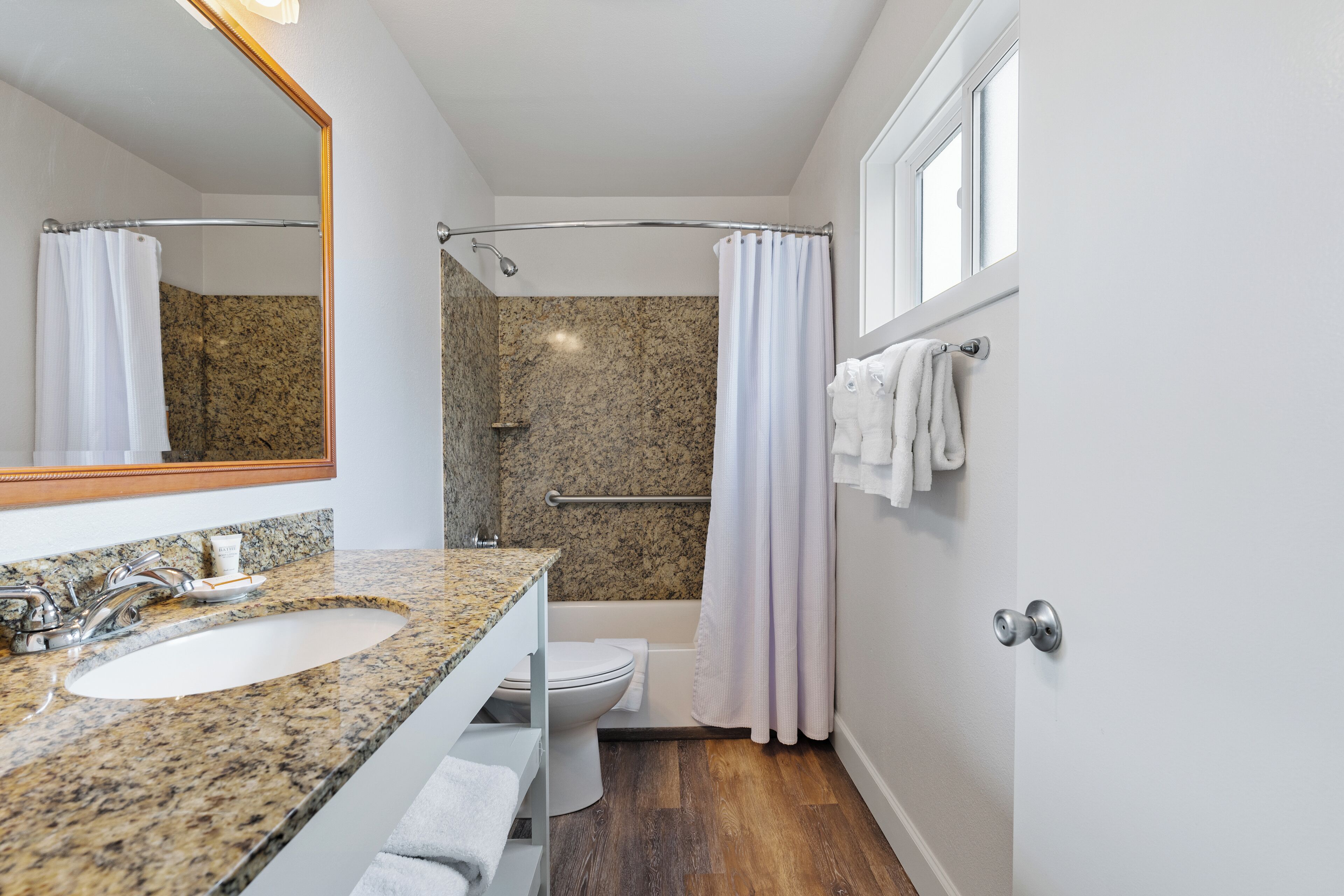 combined shower/bathtub, free toiletries, hair dryer, towels