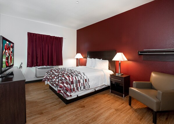 Desk, laptop workspace, iron/ironing board, free cribs/infant beds