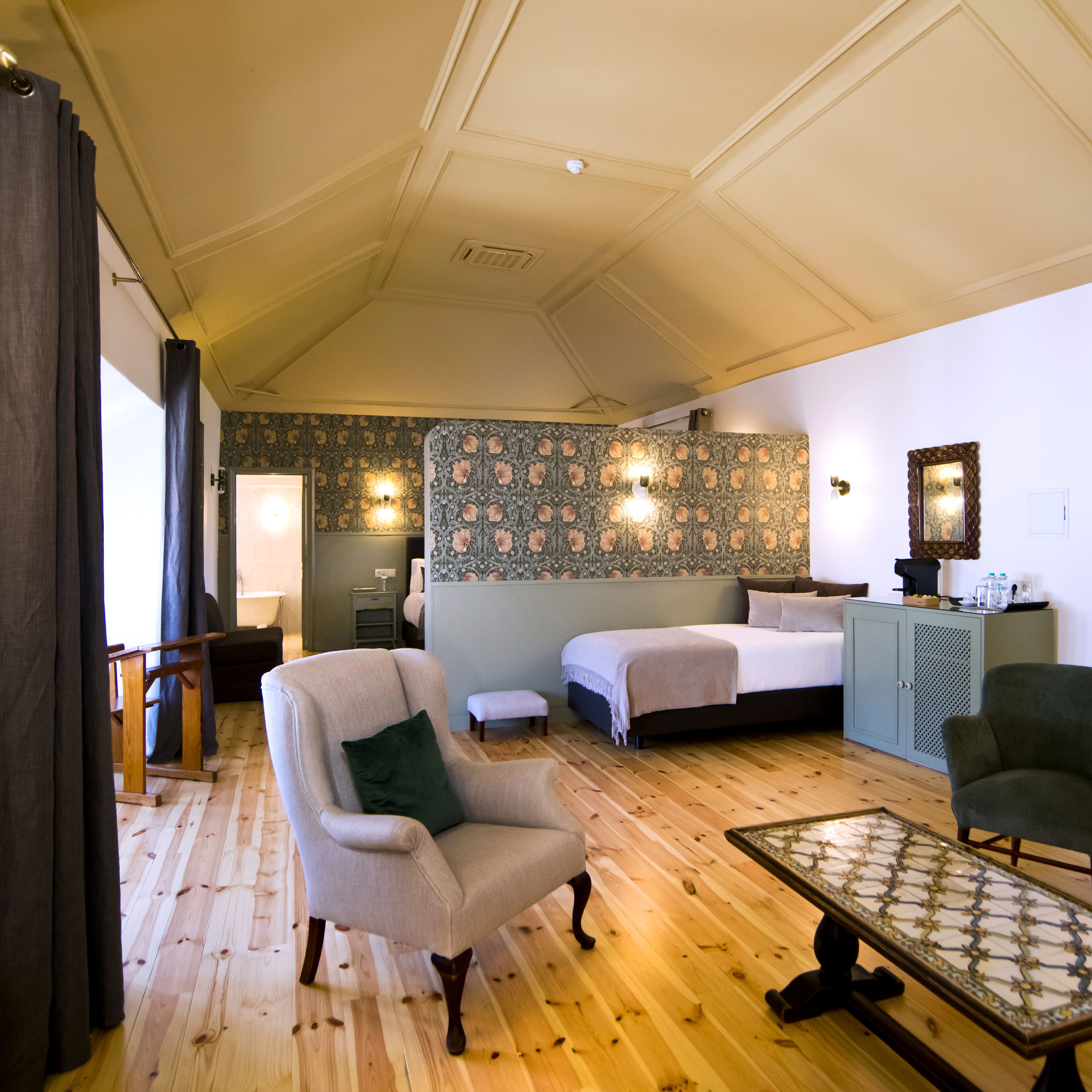 junior suite | living area | flat-screen tv