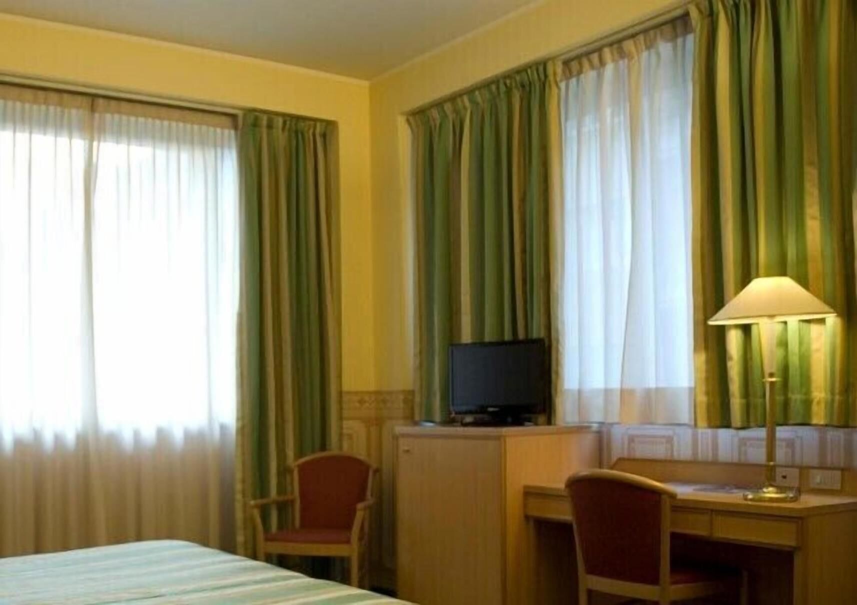 Premium bedding, down duvets, pillow-top beds, in-room safe
