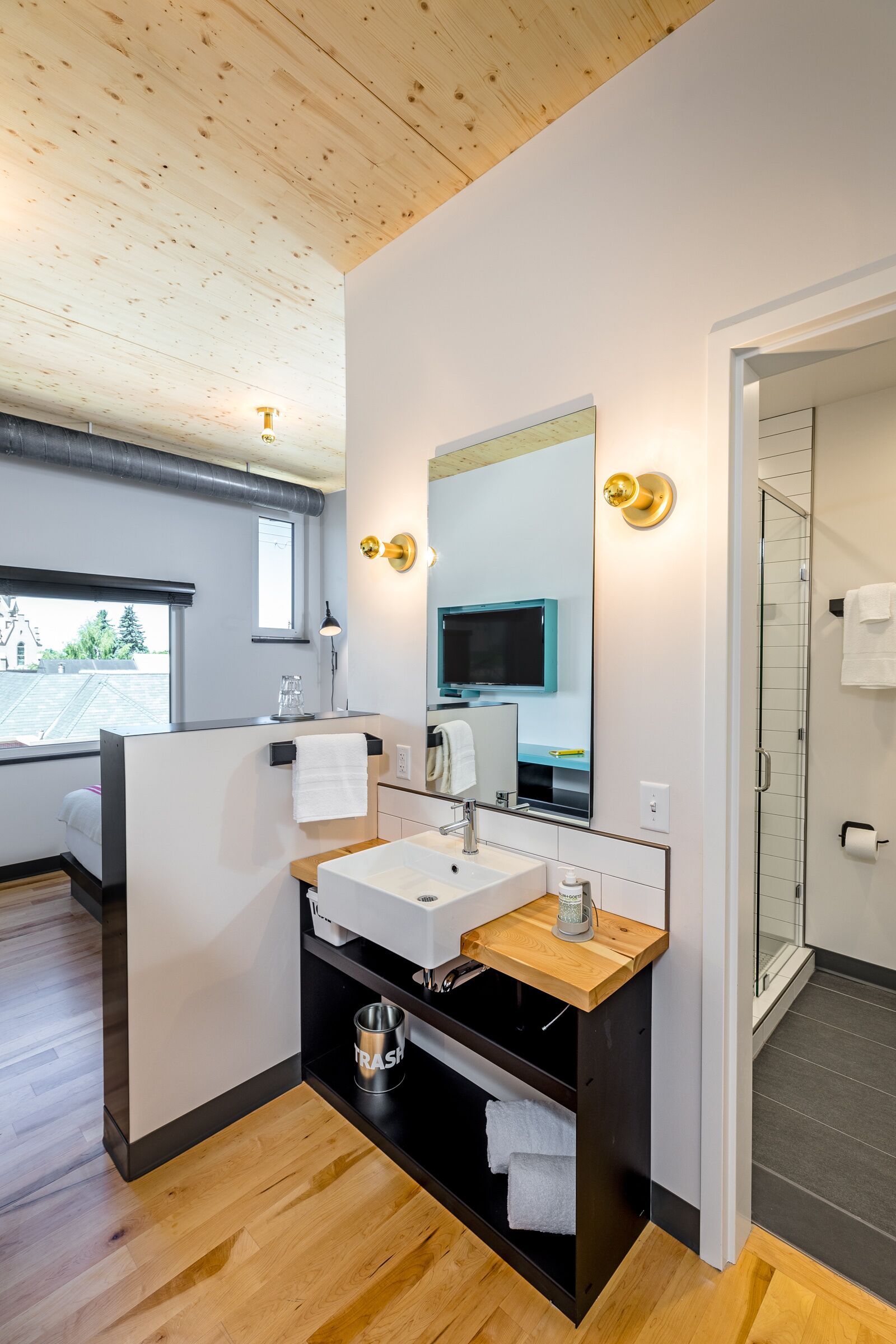 standard room, 1 queen bed (micro queen) | bathroom | shower, eco-friendly toiletries, hair dryer, bathrobes