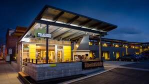 A modern building with a flat roof and a sign that reads "LARK". - The LARK Bozeman (Bozeman)