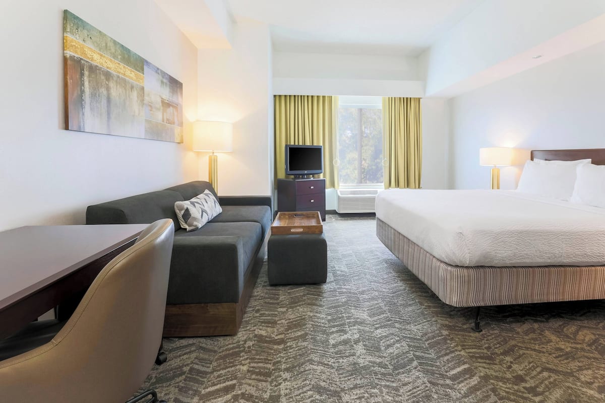 down duvets, pillow-top beds, desk, blackout curtains