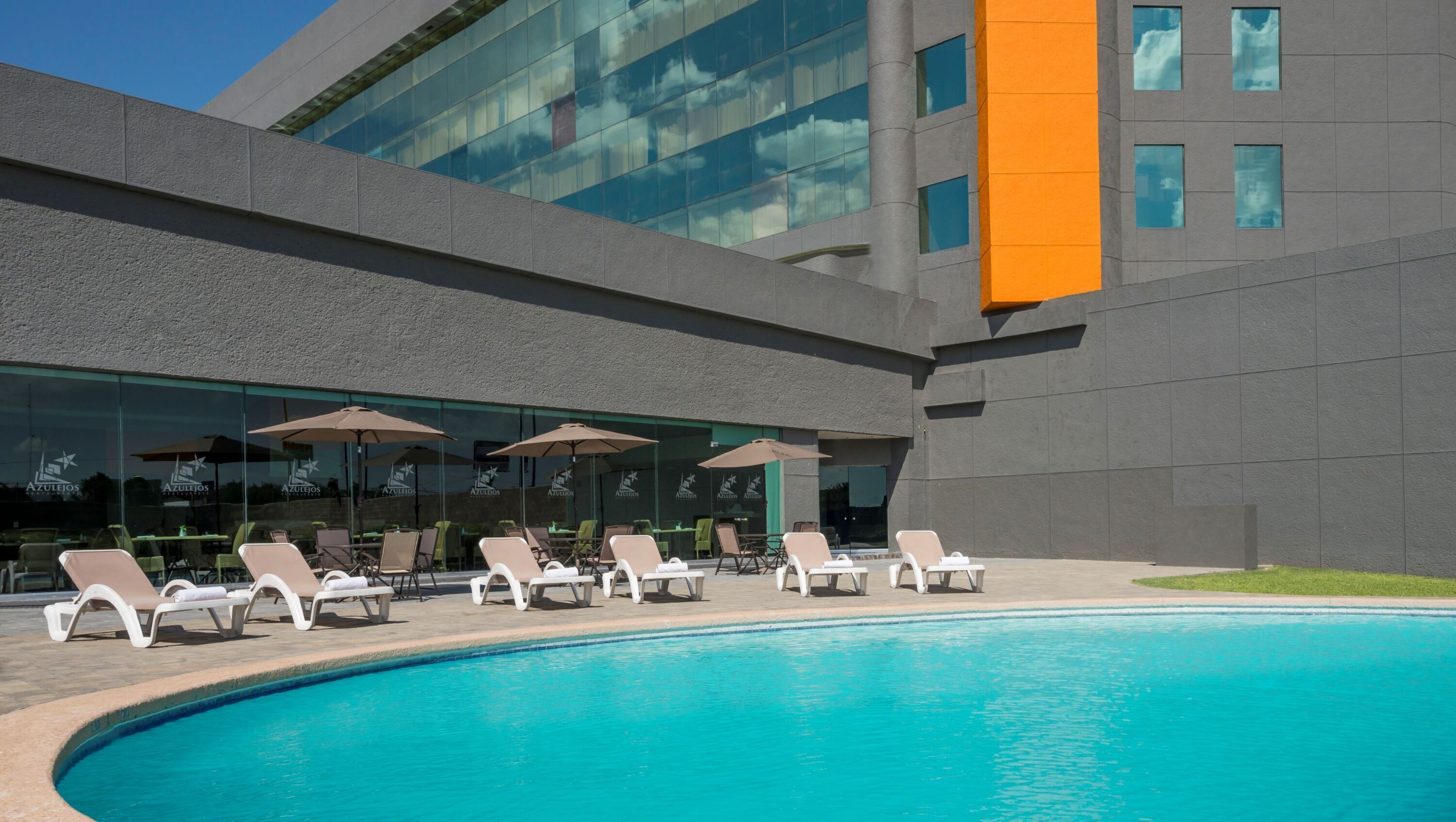 Outdoor pool, open 7:00 AM to 8:00 PM, sun loungers