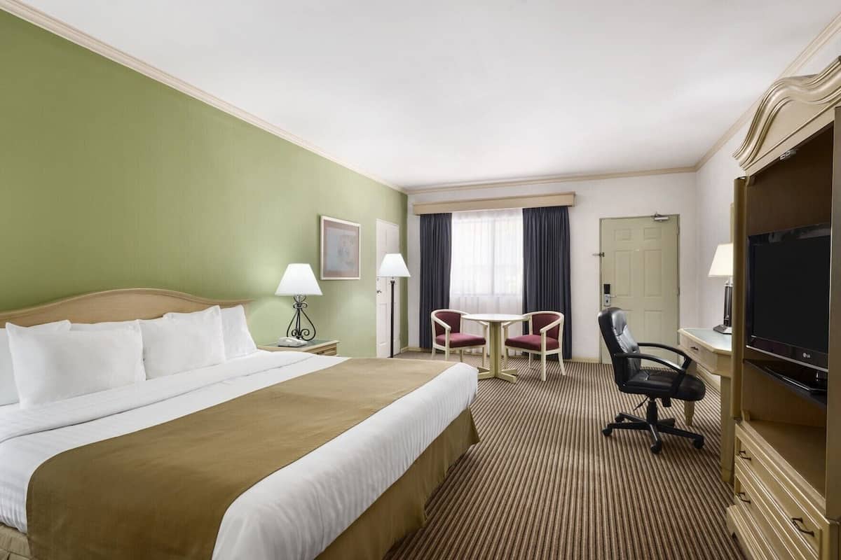 Premium bedding, down comforters, pillowtop beds, in-room safe