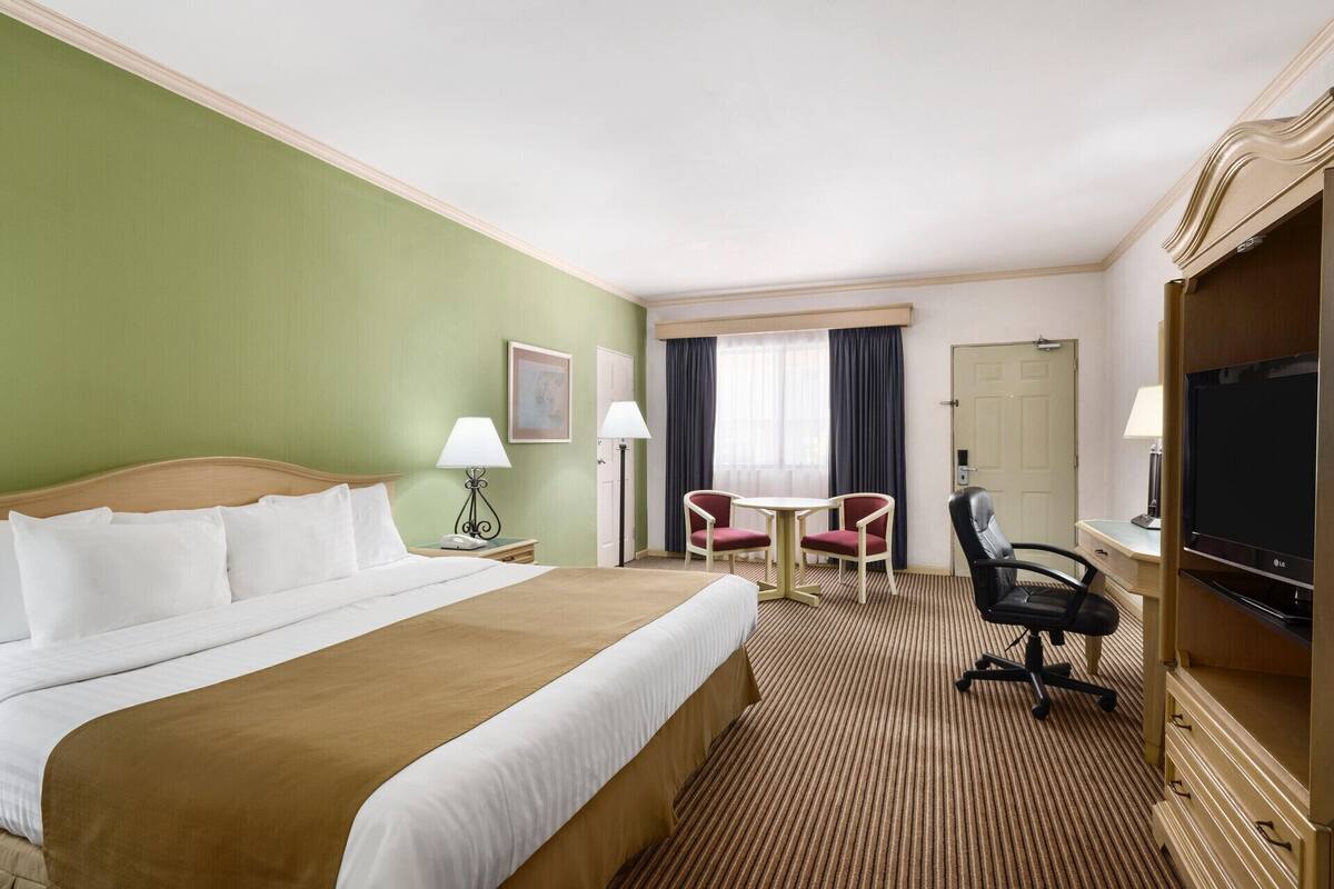 Premium bedding, down duvets, pillow-top beds, in-room safe