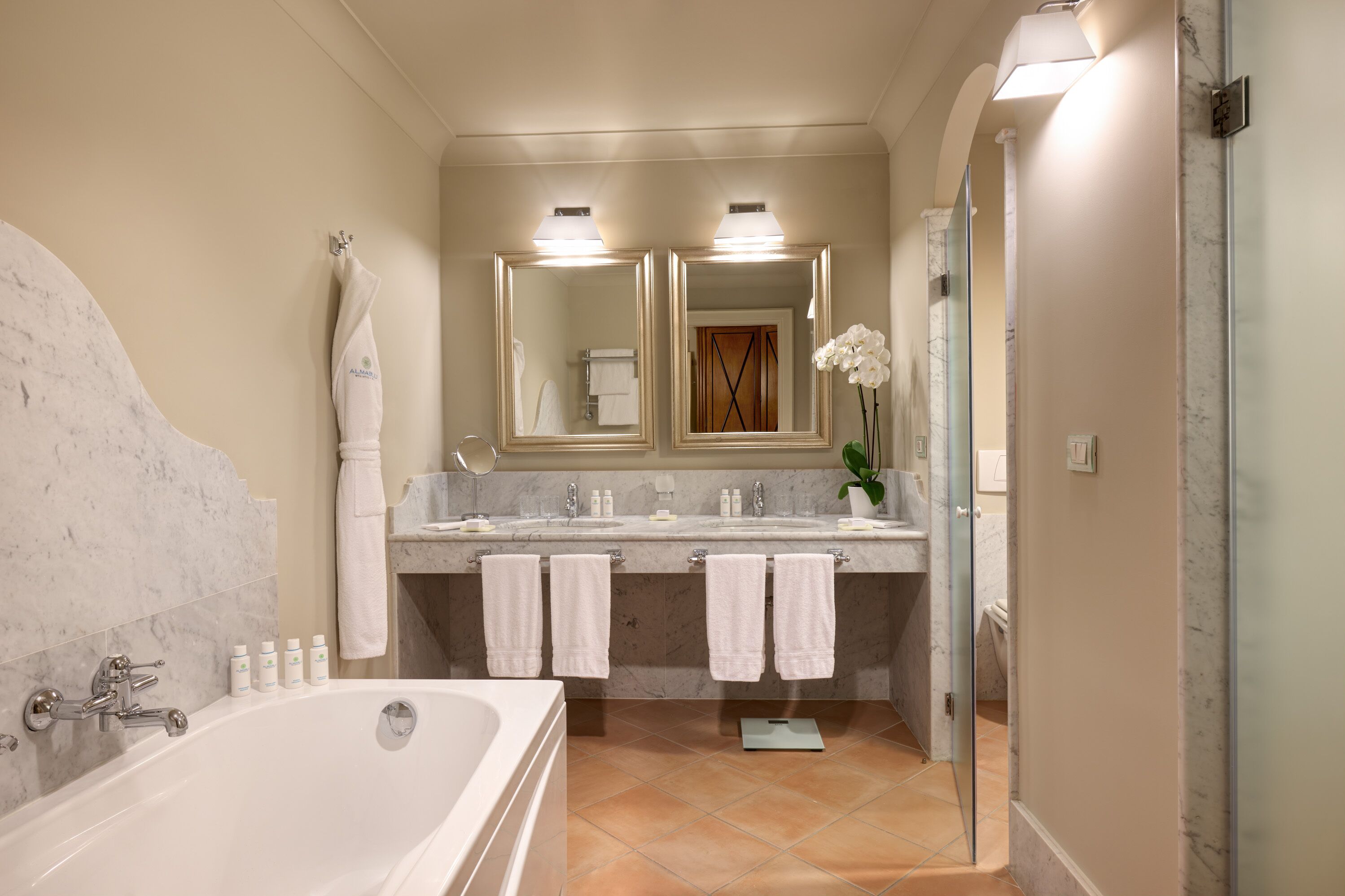 separate bathtub and shower, free toiletries, hair dryer, bathrobes