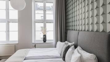 Suite, Sauna | Desk, blackout drapes, iron/ironing board, WiFi (free)