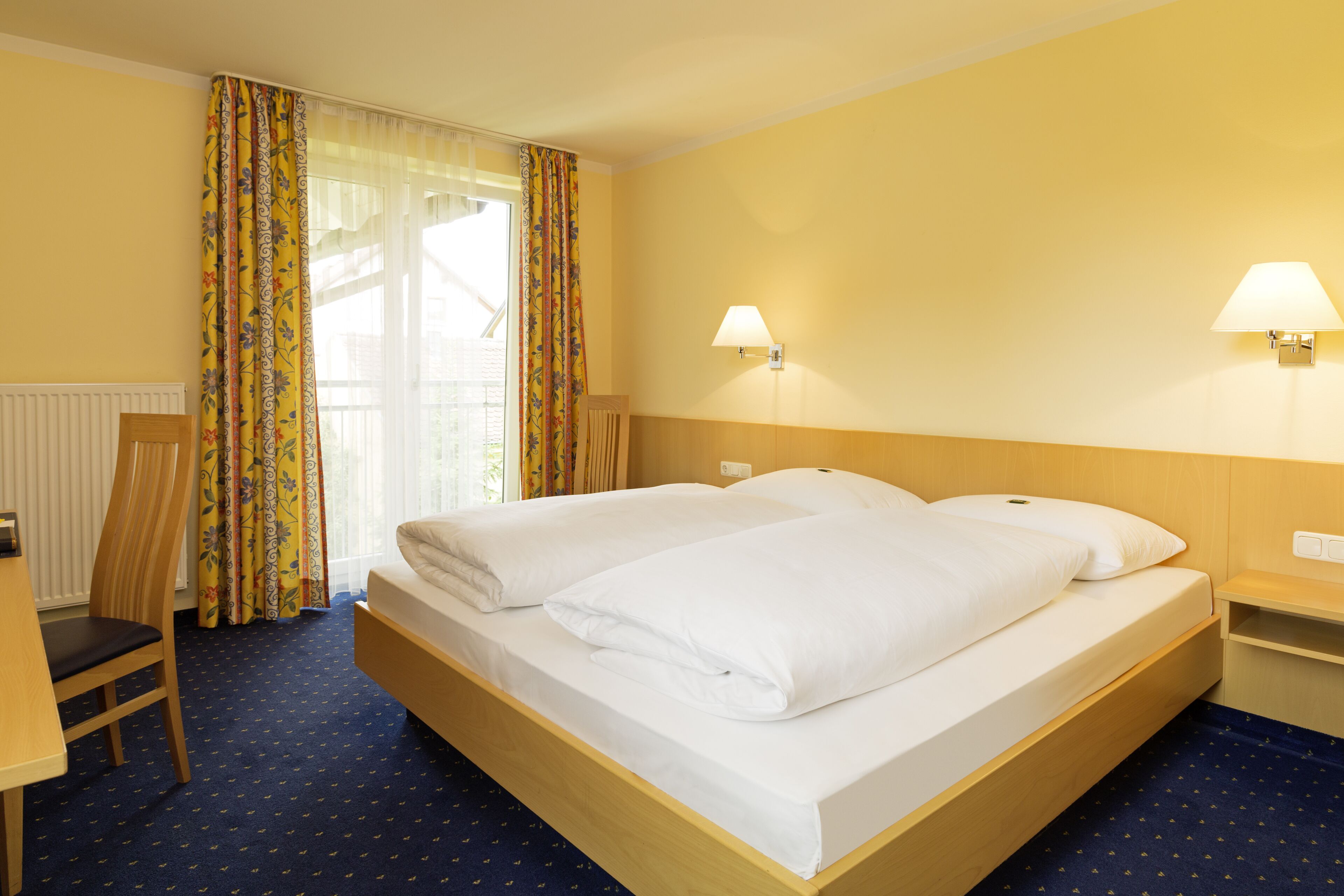 Habitación doble Confort | Escritorio, cortinas blackout y insonorización 