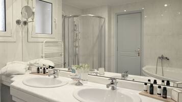 Junior Suite, Jetted Tub | Bathroom | Free toiletries, hair dryer, bathrobes, slippers