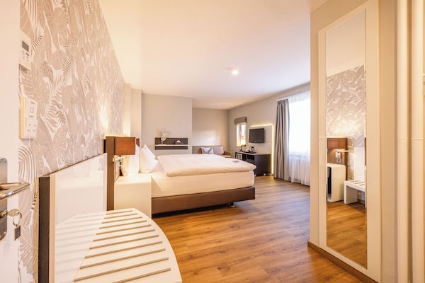 Premium bedding, down duvets, pillow-top beds, minibar