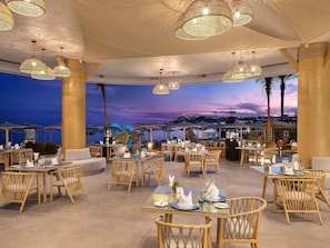 3 bars/lounges, 2 poolside bars, beach bar