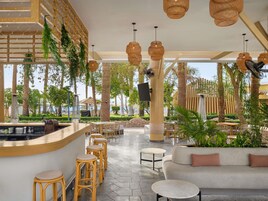 3 bars/lounges, 2 poolside bars, beach bar