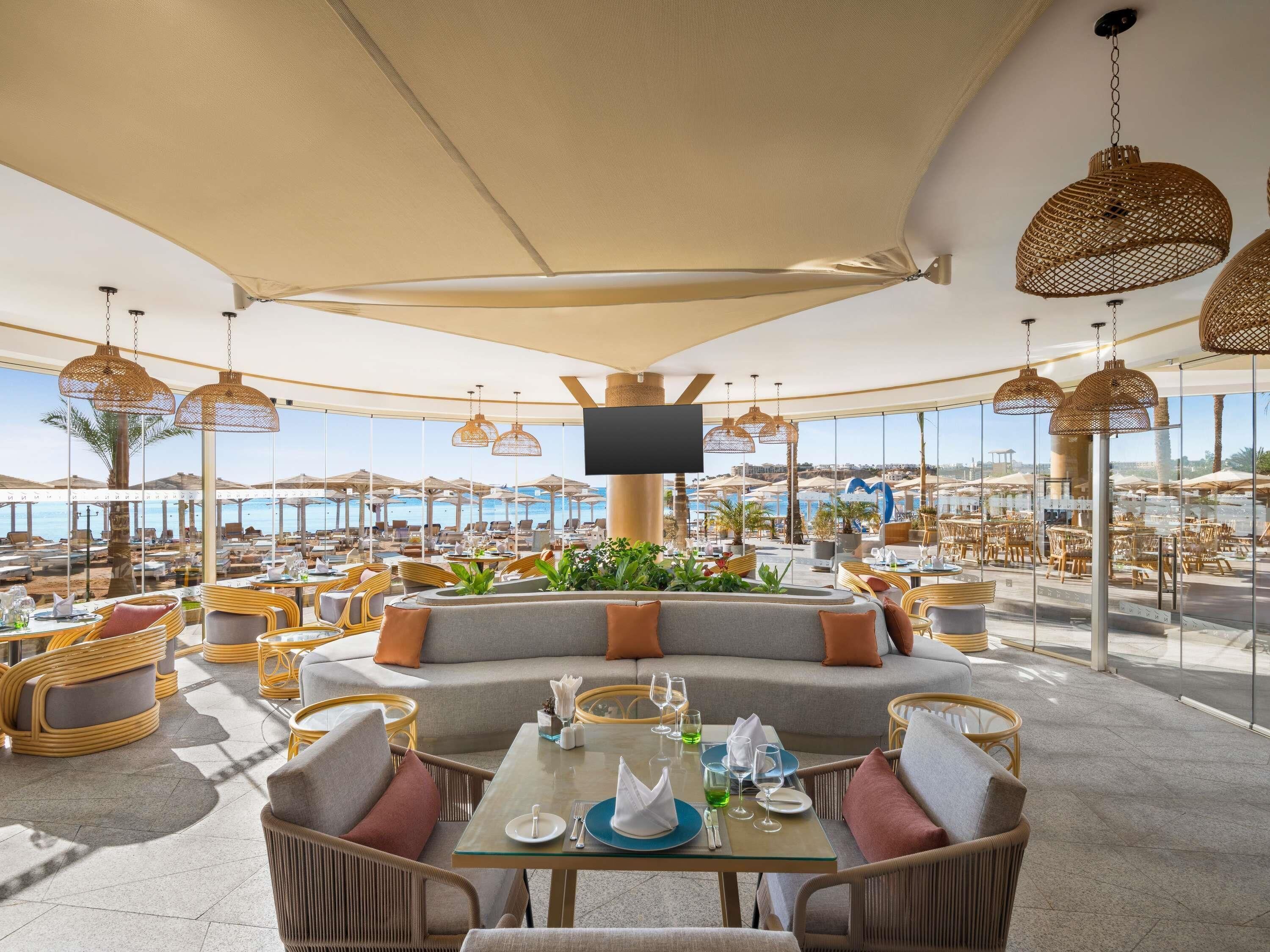 3 bars/lounges, 2 poolside bars, beach bar