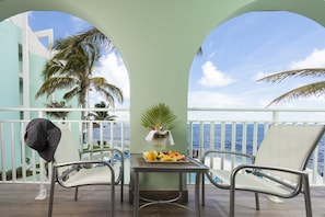 Ocean Front Courtyard Room | Balcony - Oyster Bay Beach Resort (Oyster Pond)