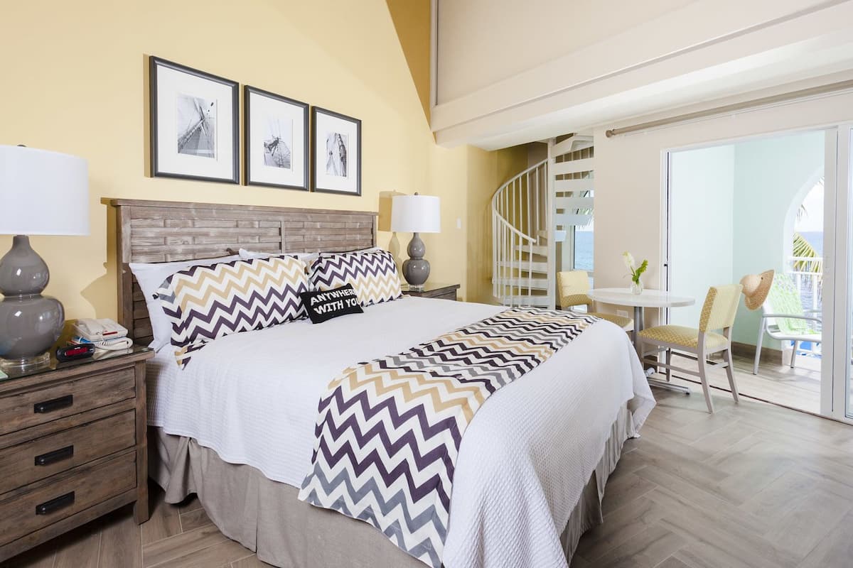 Deluxe Courtyard Loft | Premium bedding, in-room safe, blackout curtains, iron/ironing board