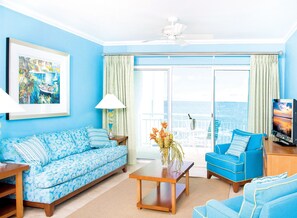 Suite, 1 Bedroom, Oceanfront | Living area | 40-inch flat-screen TV with satellite channels, TV - Oyster Bay Beach Resort (Oyster Pond)