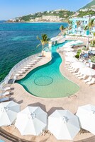 Outdoor pool, pool umbrellas, sun loungers