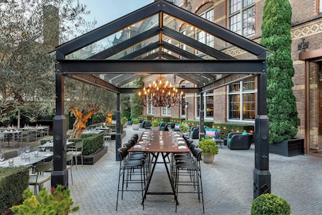 Breakfast, lunch, dinner served; international cuisine, garden views