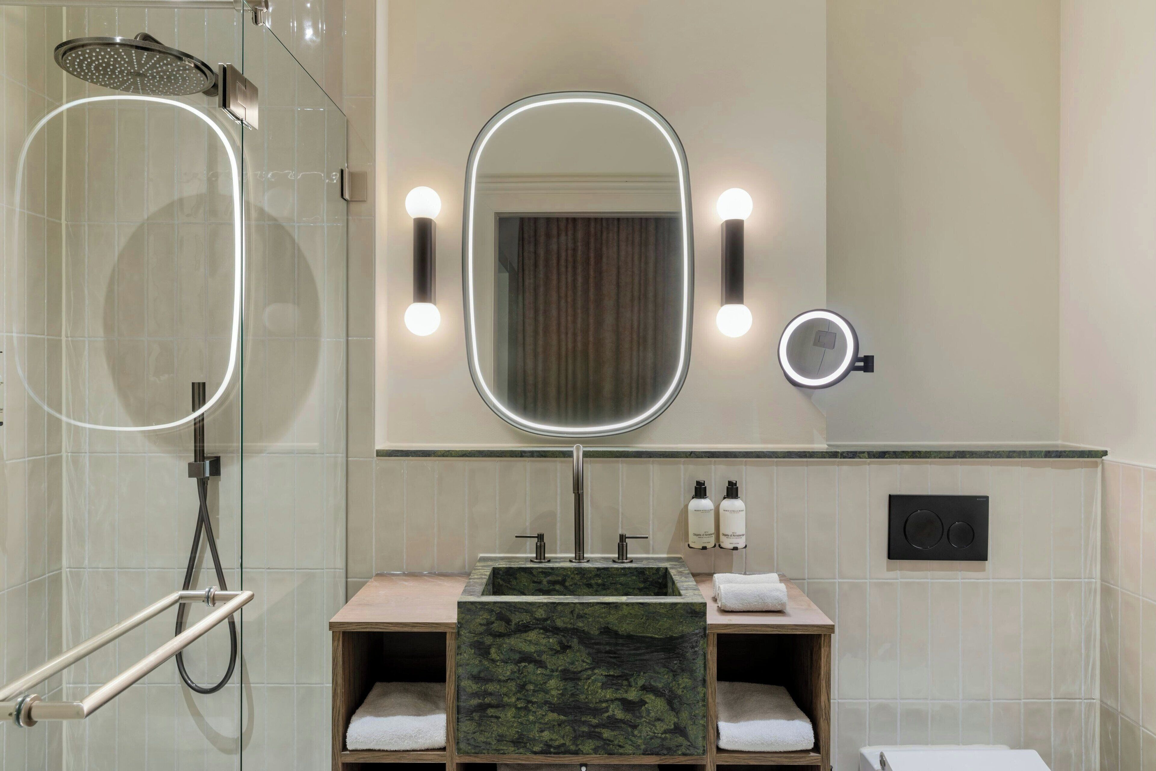 designer toiletries, hair dryer, bathrobes, slippers