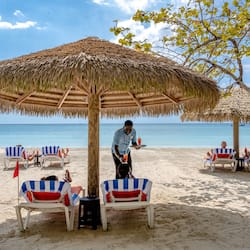 Private beach, white sand, sun loungers, beach umbrellas