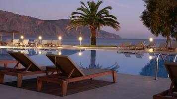 Indoor pool, 4 outdoor pools, open 10:00 AM to 6:00 PM, pool umbrellas