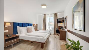 Doppel- oder Zweibettzimmer | 2 Schlafzimmer, Allergikerbettwaren, Minibar, Zimmersafe