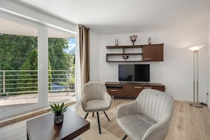 套房 | 起居区 | 50-英寸液晶电视 (配备卫星频道)、电视