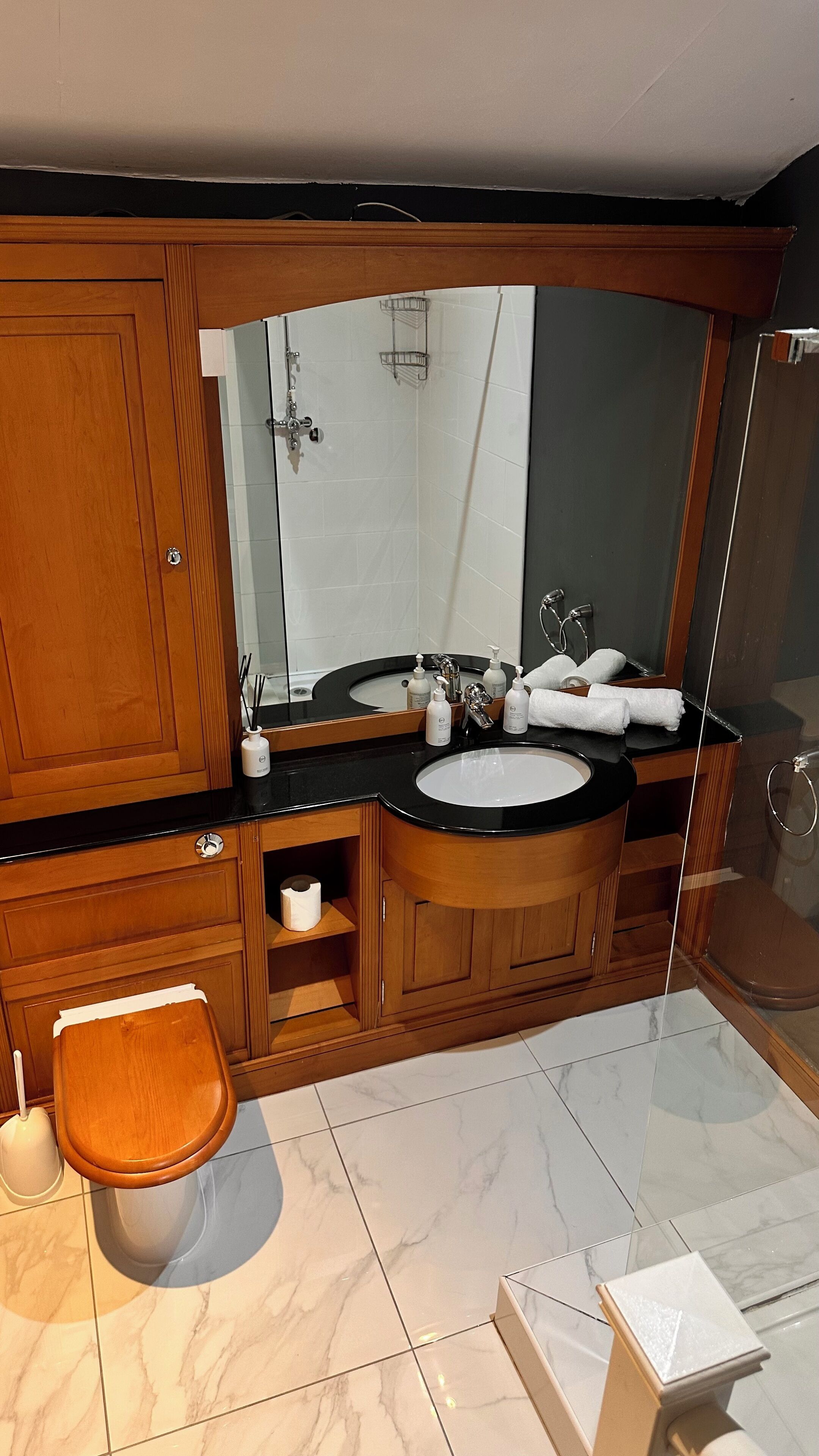 arley suite | bathroom | combined shower/bathtub, deep-soaking bathtub, rainfall showerhead